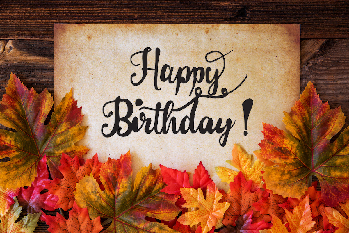 Old Paper With English Text Happy Birthday. Colorful Leaves Autumn Decoration